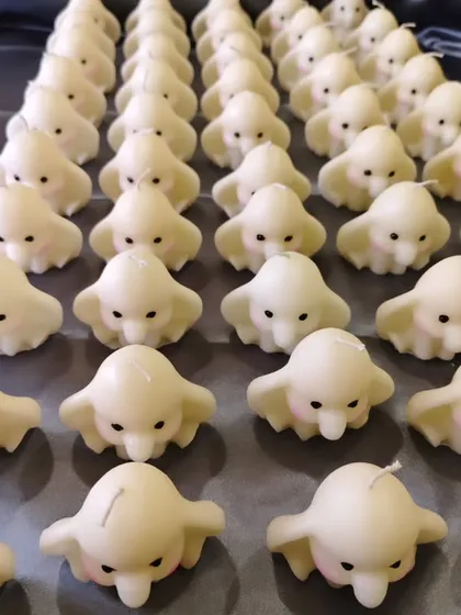 I love creating these adorable baby elephant candles. Made from 100% soy wax, they are a popular choice for baby shower return favors, and I can prepare large batches like this for your special event.