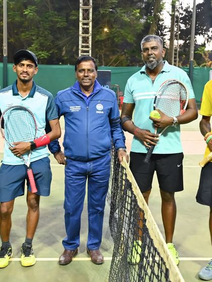 Our coaches are always on the court, ready to share their knowledge. Here are some of our senior coaches posing by the net, representing decades of combined tennis experience.
