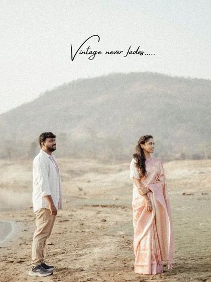 A classic, timeless portrait of a couple standing by the water's edge, with the phrase "Vintage never fades."