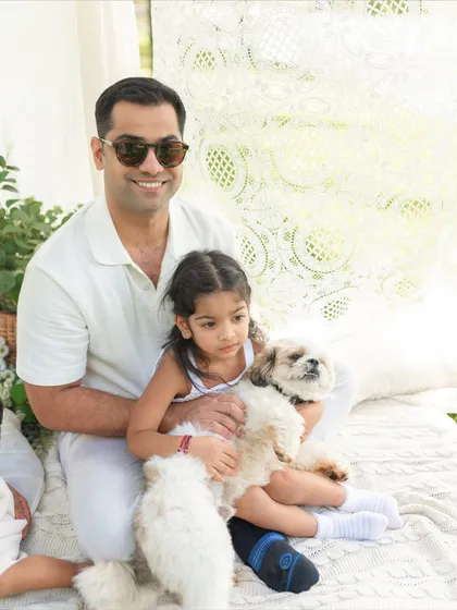 A father, his daughter, and their two furry family members. I always encourage including pets in family photoshoots, they are part of the family too.