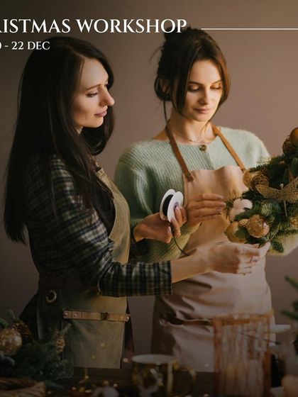 A glimpse into a Christmas workshop where guests create their own festive wreaths. We offer hands-on activities that add a personal touch to the holiday celebrations.