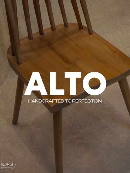 The 'Alto' chair, handcrafted to perfection. This image highlights the solid, sculpted teak seat and the elegant spindle back, a modern take on a classic design.