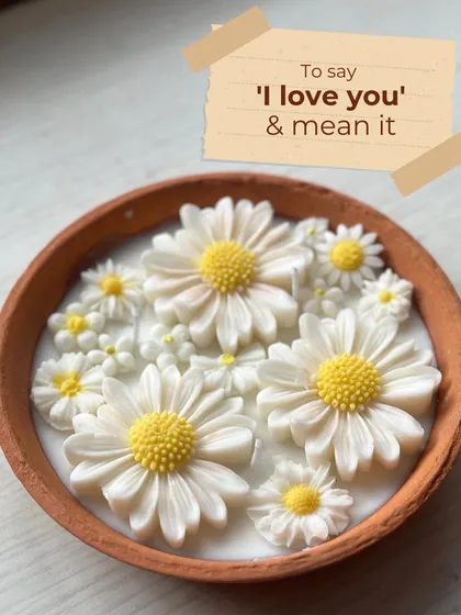 To say 'I love you' and mean it. This terracotta bowl filled with beautiful daisy candles is a unique and heartfelt gift for Valentine's Day.