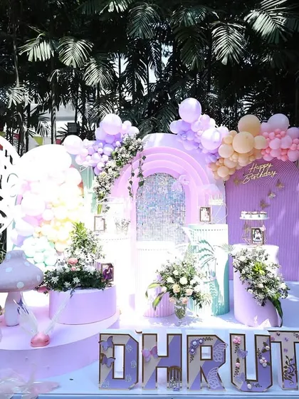 The butterfly theme is a favorite for little princesses. This setup shows how I use different elements like large wings, balloon garlands, and floral arrangements to create a cohesive and magical look.