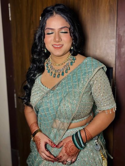 A close-up of one of the clients, her makeup looking fresh and glowing.