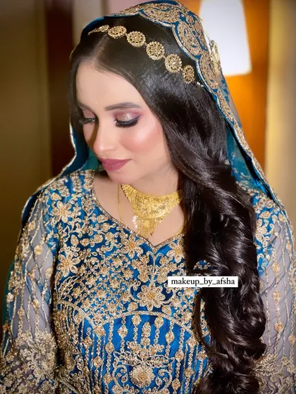 Another stunning bride in blue. The gold embroidery on her outfit is so intricate, and I matched it with a soft gold and brown eye makeup look.