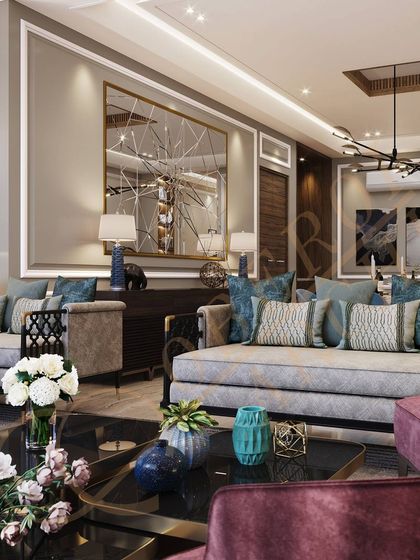 We design spacious rooms with extravagant interiors, even in smaller apartments. The key is smart furniture placement and a cohesive design that makes the room feel grand and uncluttered.