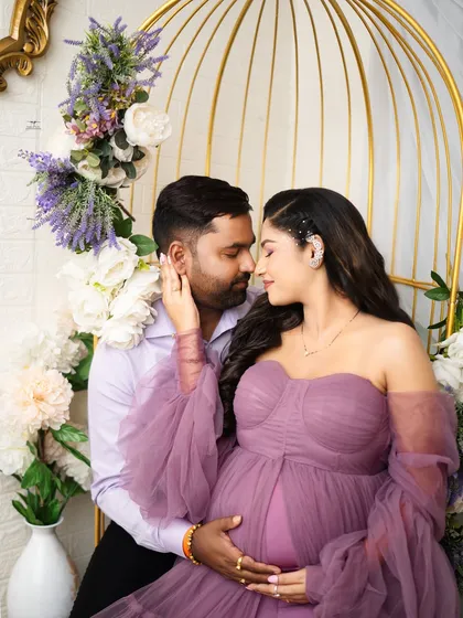 An intimate close-up of the couple, their faces close together. This shot focuses on the emotional connection and quiet anticipation they share.