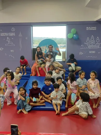A gym full of happy faces! This is a snapshot from Vedansh's party, with all the kids and parents gathered for a group photo. Our space is perfect for creating shared memories.