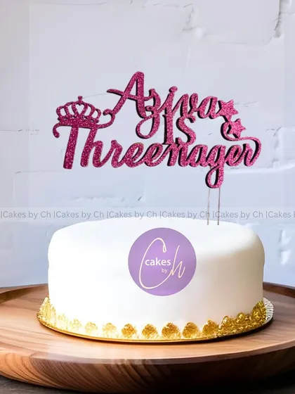 For the little one who is now a "Threenager"! This sparkly pink glitter topper with a crown detail is a fun and sassy way to celebrate a third birthday.