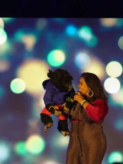 A beautiful shot of me and Nikki against a bokeh background. This captures the magical feeling of being on stage and spreading happiness.