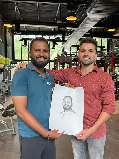 Hero Item. There's no greater feeling than seeing a client's smile when they receive a piece of art made just for them. This is why I do what I do, turning moments into timeless charcoal portraits.