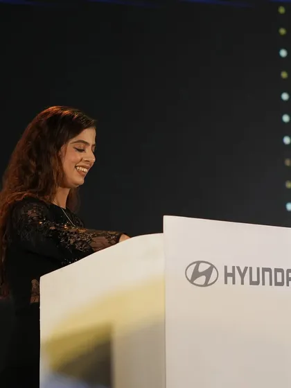 A smile on stage at the Hyundai NCCM event. I genuinely enjoy celebrating the success of others, and I think it shows.