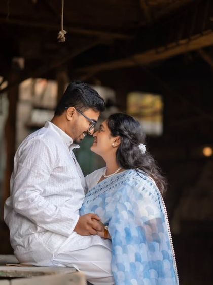 An intimate pre-wedding moment in a rustic setting. I look for unique frames that tell a story of closeness and affection.