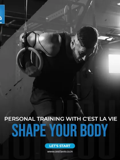 Shape your body with varied and challenging workouts. Here, a member utilizes gymnastic rings for a strength exercise, highlighting our equipment for advanced functional and bodyweight training.