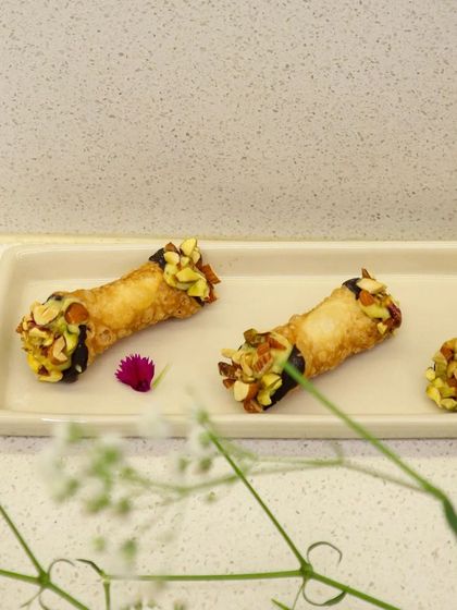 Another look at the Badam Halwa cannoli, a luxurious and indulgent treat that combines the best of both worlds.