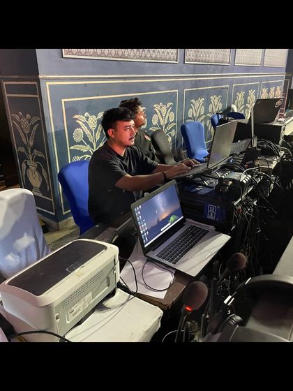 A console operator at work during the Confluence 2025 conference in Jaipur. We ensure every presentation and session runs smoothly.