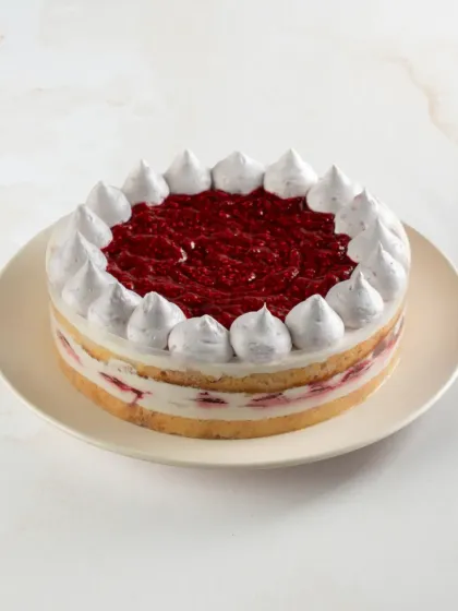 The Lite Raspberry Tres Leches Cake is topped with a vibrant raspberry puree, giving you that lovely berry flavour in every bite.