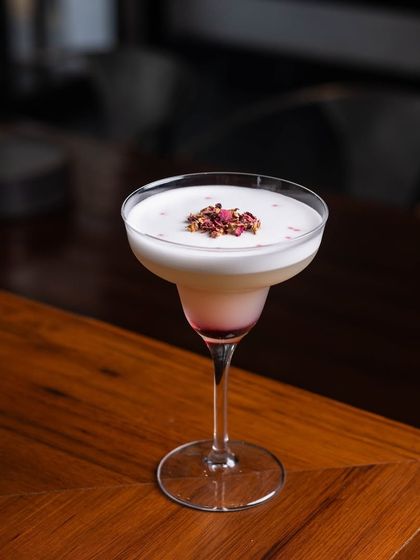 Start the week with some good vibes. My Almafi mocktail, with its beautiful layers and floral garnish, is sure to lift your spirits.