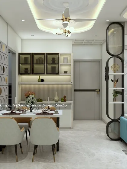 A combined living and dining area where a stylish black partition and a well-designed crockery unit create a sense of order and elegance.