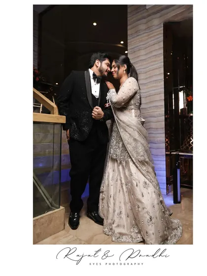 A classic, happy portrait from Rajat and Pradhi's engagement. I guided them into a pose that felt natural and joyful, capturing their smiles and the elegant details of their outfits.
