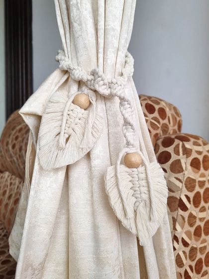 Get ready to tie up your space in style. Our macrame curtain ties with leaf details are the perfect bohemian-inspired accessory to elevate your window treatments.