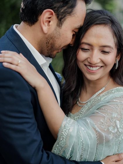 A beautiful, happy portrait of the couple, their smiles radiating the joy of this special milestone.