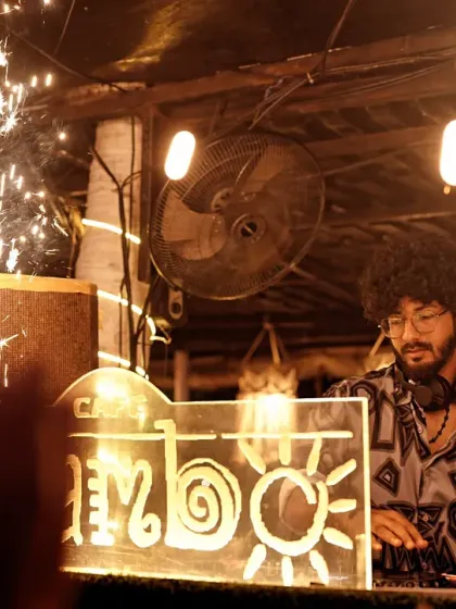 A great set needs a great stage. This shot from Cafe Mambo, framed by sparklers, shows how I integrate with full production setups to create a visually stunning experience that matches the intensity of the music.