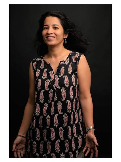 Another frame from the same session, maintaining the bright and positive feel of the portrait series.