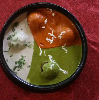 Our Veg Guldasta is a signature dish, featuring vegetable koftas in a unique combination of three different gravies, creating a beautiful and flavorful presentation.