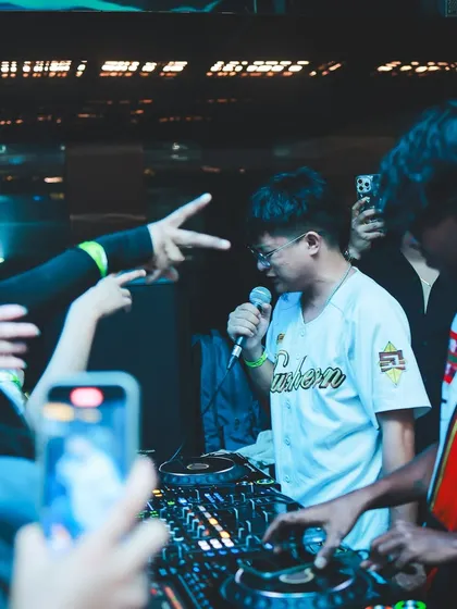 An artist hypes the crowd while I hold down the beat. These live interactions make each performance unique and full of energy.
