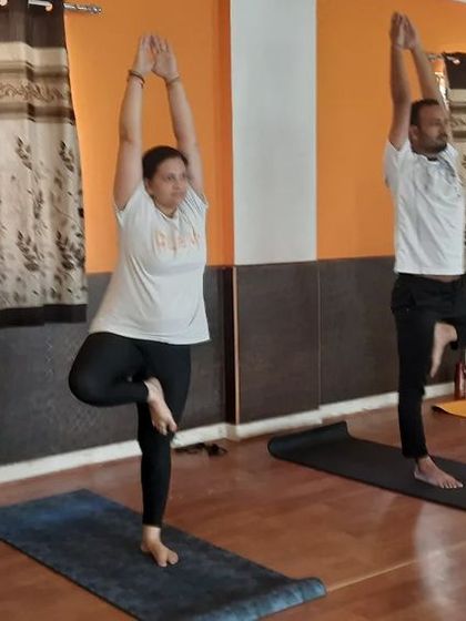 A duplicate of image 43, showing the mixed group in Tree Pose.