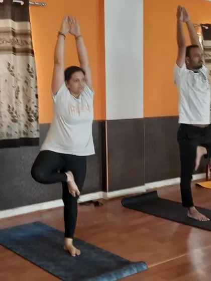 A duplicate of image 43, showing the mixed group in Tree Pose.