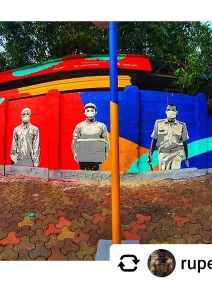 A panoramic mural in Mahim dedicated to the "Covid Warriors." The artwork honors doctors, police officers, and delivery personnel who worked on the frontlines during the pandemic.