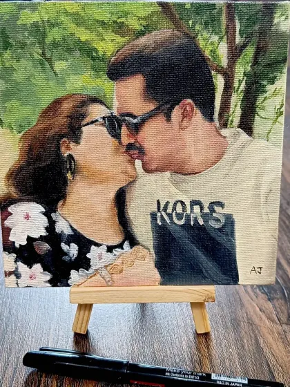 A miniature 6x6 inch oil painting of a couple, perfect for a desk or a small nook. These make for very cute and personal gifts.