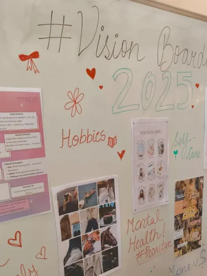 A close-up of the collective vision board from our workshop, filled with hopes for self-care, travel, and mental health. This is what community goal-setting looks like.