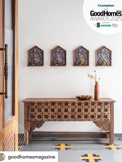 The foyer of Prangan, with its repurposed teak console and custom stone flooring, was another key element highlighted in our award-winning feature for "Crusader of Indian Designs."