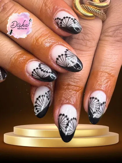 I love creating intricate patterns. This design features a delicate, fan-like motif hand-painted in black, creating a beautiful contrast and an elegant, artistic look.