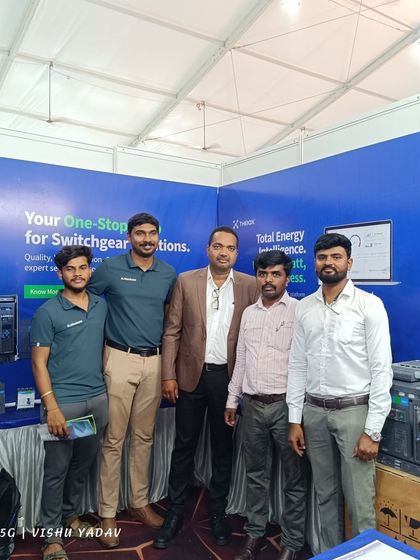 My team at our booth during the IMEX Hubli 2025 industrial exhibition, after four energizing days.
