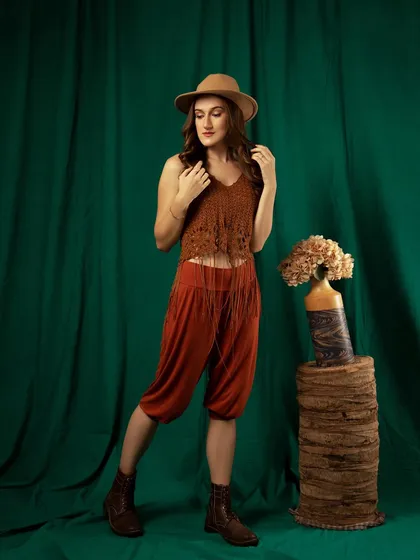 A standing full-body shot. This gives a clear view of the outfit and the model's posture.
