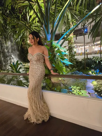 A stunning feather gown for an event in Thailand. I love dressing up for destination weddings and bringing a touch of glamour to every location.