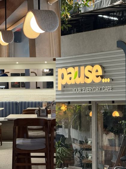 The inviting exterior and interior of 'Pause... Your Everyday Cafe' in Bandra.