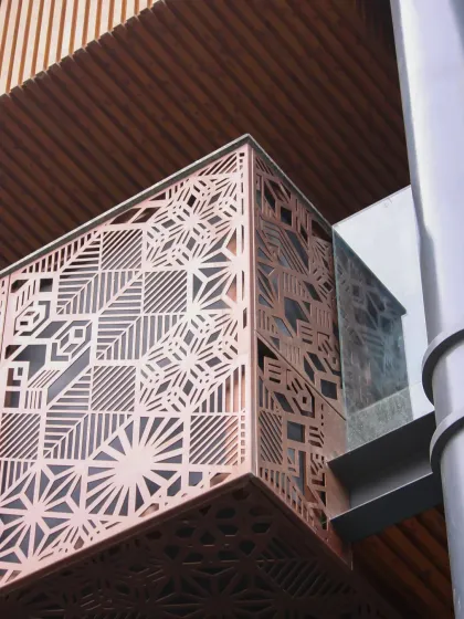 From the smooth MS columns to the geometric play of the MS Jali, this facade is a masterclass in texture. The light and shadow create a constantly shifting artwork on the building's surface.