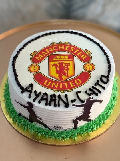 A custom photo cake for a Manchester United fan. I can feature any team logo to create the perfect cake for a true supporter.