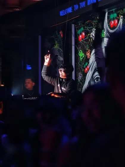 A shot from the DJ booth, with the crowd fully immersed in the music. This is my office, and I love every minute of it.