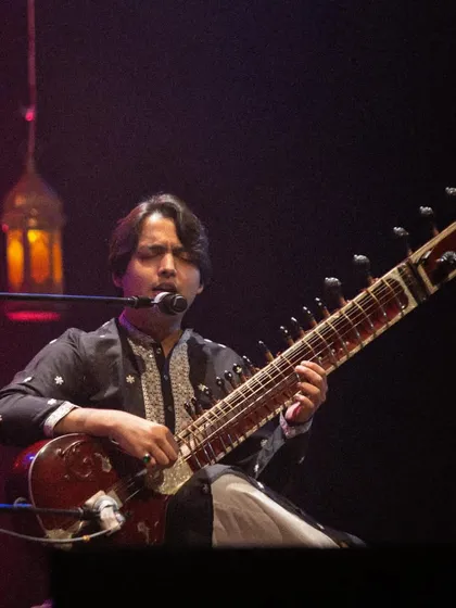 Singing a few lines of a ghazal before beginning the sitar rendition. It was a unique experience to perform Indian classical music for a poetry-loving audience.
