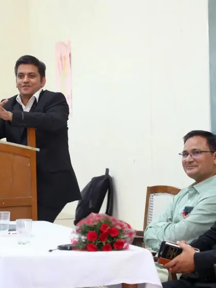Sharing a lighter moment with faculty members during my lecture at JNVU. Academic collaborations are always enriching.