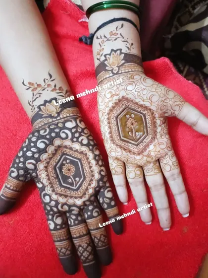 A close-up of the dual-style design, showing the contrast between the dark-filled hand and the lighter, outline-focused hand.