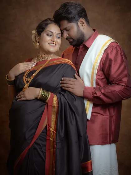 An intimate moment between an expecting couple during a fine-art studio session. I guide my clients into poses that feel natural and loving, capturing the connection and excitement you share.