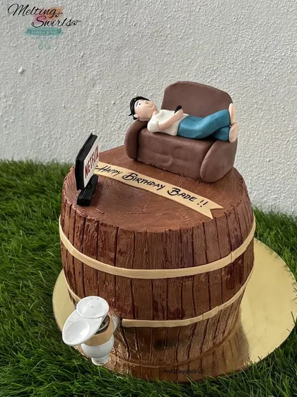 We love a fun challenge, and this working barrel cake was an absolute blast to make. Shaped like a wooden barrel, it actually pours a drink from the tap, with a fun fondant figure relaxing on top.